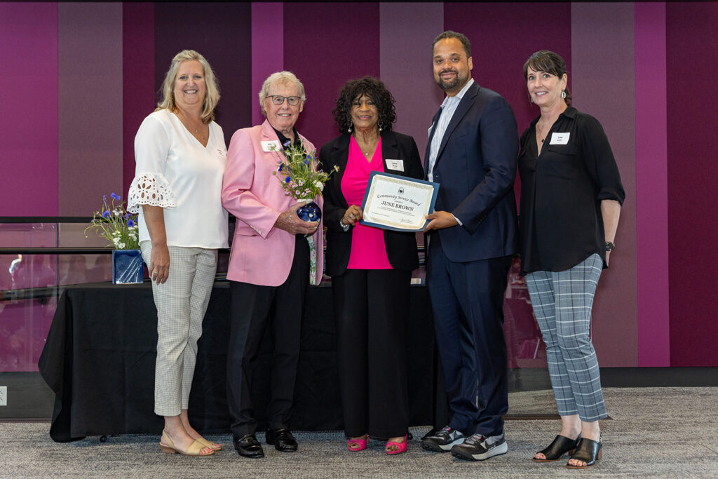 Photo of 2024 Community Service Awardee June Brown with Jamie Opsal and Bill Siedhoff (Senior Fund), Jared Boyd (Office of the Mayor), and Lisa Smith (Voyce). 