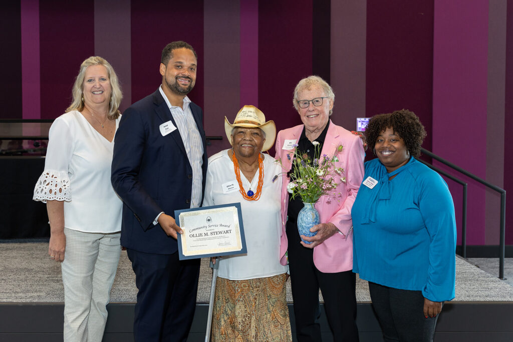 Photo of 2024 Community Service Awardee Ollie Stewart with Jamie Opsal and Bill Siedhoff (Senior Fund), Jared Boyd (Office of the Mayor), and Ebony Young (DD Resources). 